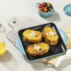 Le Creuset 9.5" Square Signature Enameled Cast Iron Grill Pan | Caribbean Blue 11 Le Creuset 9.5" Square Signature Enameled Cast Iron Grill Pan | Caribbean Blue -Kitchen Store l2127 2417 d 1